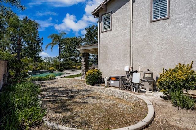 12719 E Rancho Estates Pl, Rancho Cucamonga, CA 91739 - view of yard featuring a balcony, an outdoor pool, and a patio