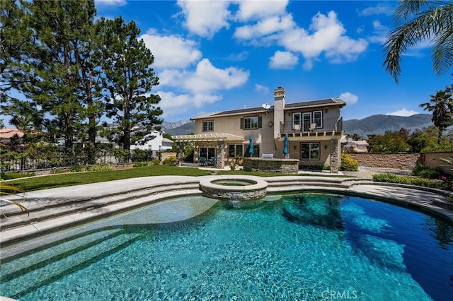 12719 E Rancho Estates Pl, Rancho Cucamonga, CA 91739 - view of swimming pool featuring a pergola, a mountain view, a patio, and a pool with connected hot tub