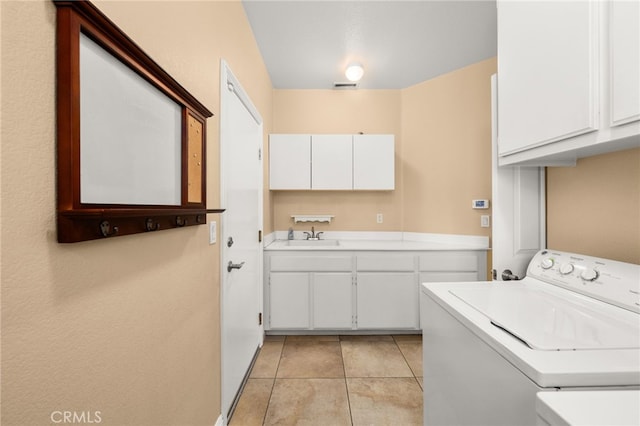 12719 E Rancho Estates Pl, Rancho Cucamonga, CA 91739 - washroom featuring cabinet space, light tile patterned floors, and washer and clothes dryer