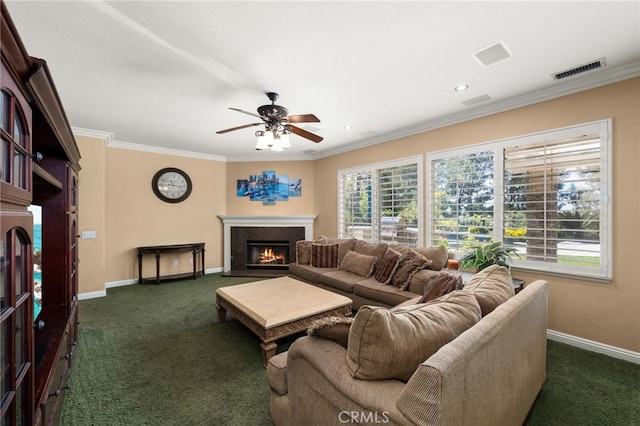 12719 E Rancho Estates Pl, Rancho Cucamonga, CA 91739 - living room with dark colored carpet, a glass covered fireplace, baseboards, ceiling fan, and crown molding