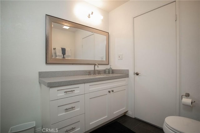 54229 Oakhill Ln, Quinta, CA 92253 - bathroom featuring vanity and toilet