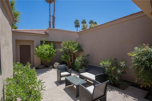 54229 Oakhill Ln, Quinta, CA 92253 - view of patio / terrace with an outdoor living space