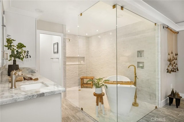20402 Seven Seas Ln, Huntington Beach, CA 92646 - full bath featuring a freestanding bath, vanity, and a walk in shower