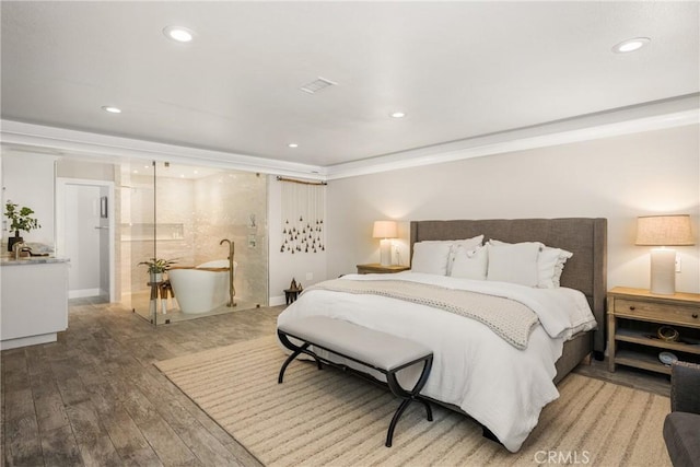 20402 Seven Seas Ln, Huntington Beach, CA 92646 - bedroom featuring light wood-style flooring, recessed lighting, and crown molding