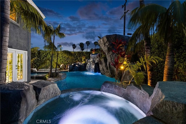 20402 Seven Seas Ln, Huntington Beach, CA 92646 - view of pool with an in-ground hot tub and french doors
