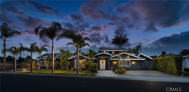 20402 Seven Seas Ln, Huntington Beach, CA 92646 - view of front facade with solar panels