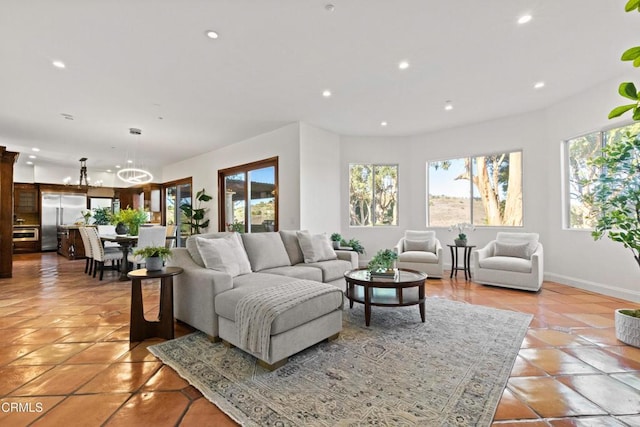 13045 Ripple Creek Ln, Camarillo, CA 93012 - living area featuring light tile patterned floors, recessed lighting, and a chandelier