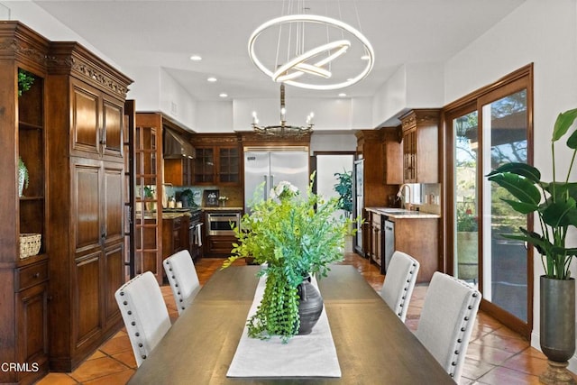 13045 Ripple Creek Ln, Camarillo, CA 93012 - dining area featuring a chandelier, light tile patterned flooring, and recessed lighting