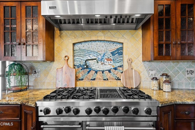13045 Ripple Creek Ln, Camarillo, CA 93012 - kitchen featuring extractor fan, double oven range, backsplash, glass insert cabinets, and light stone counters