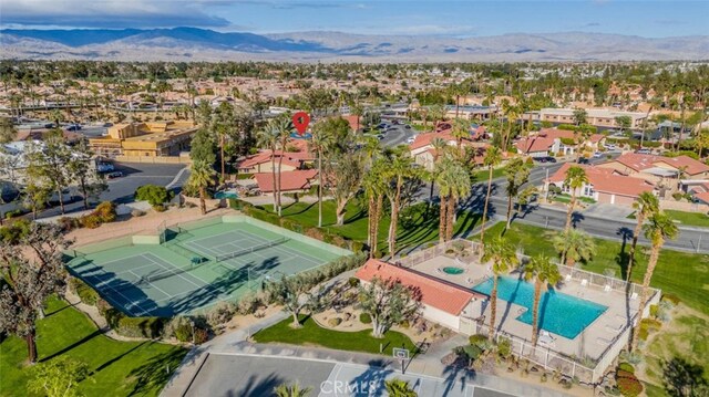 40033 Sagewood Dr, Palm Desert, CA 92260 - aerial perspective of suburban area featuring a pool and a mountain backdrop
