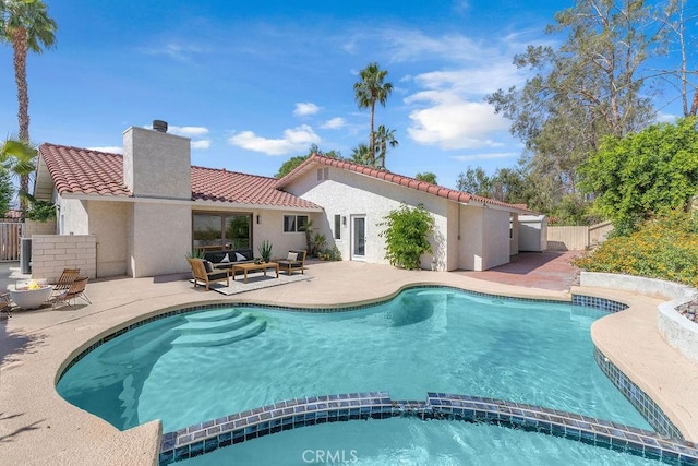40033 Sagewood Dr, Palm Desert, CA 92260 - view of swimming pool featuring a pool with connected hot tub, an outdoor hangout area, and a patio