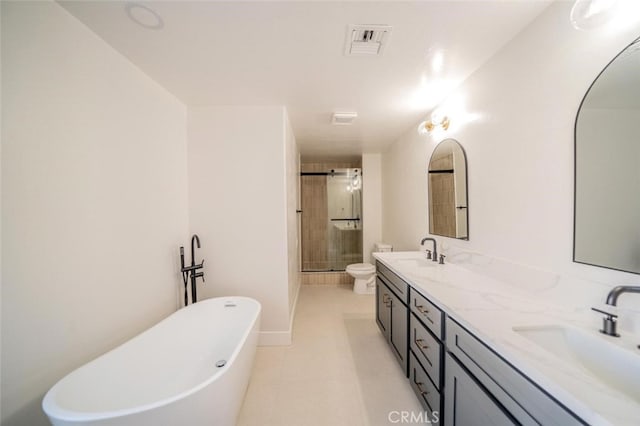 40033 Sagewood Dr, Palm Desert, CA 92260 - bathroom featuring a shower stall, double vanity, a soaking tub, toilet, and tile patterned floors