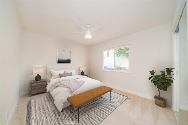 40033 Sagewood Dr, Palm Desert, CA 92260 - bedroom with light colored carpet, baseboards, and a ceiling fan