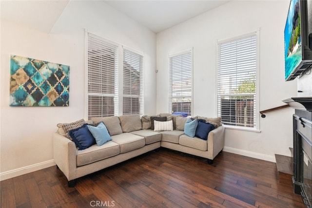 29290 Morena Villa Dr, Highland, CA 92346 - living room featuring dark wood-style flooring and baseboards