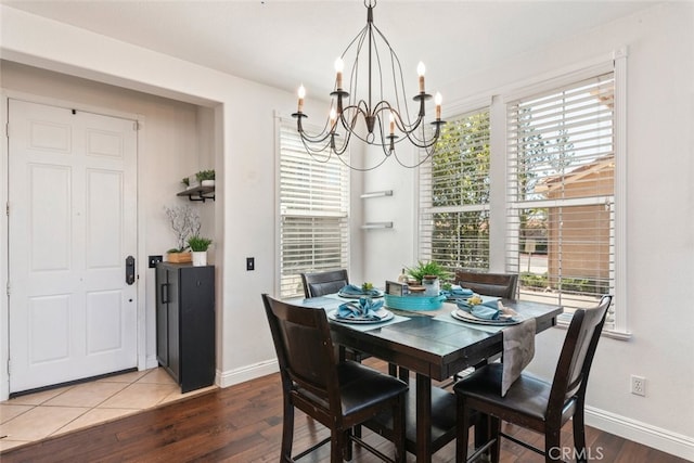 29290 Morena Villa Dr, Highland, CA 92346 - dining space with a chandelier, wood finished floors, and baseboards
