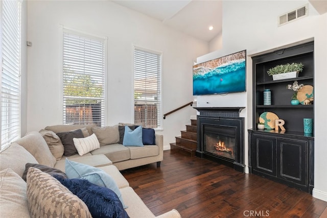29290 Morena Villa Dr, Highland, CA 92346 - living area featuring hardwood / wood-style floors, a glass covered fireplace, and recessed lighting