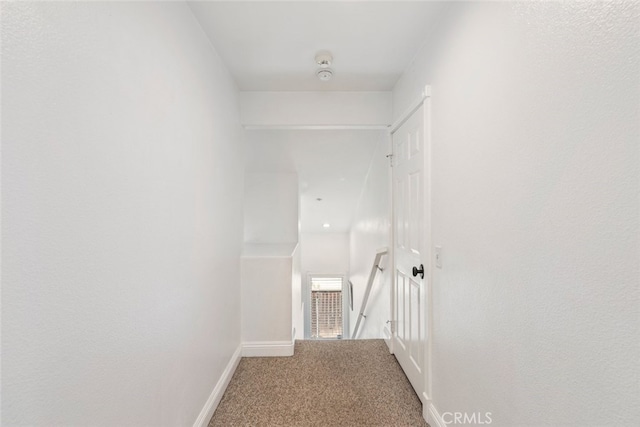 29290 Morena Villa Dr, Highland, CA 92346 - hallway with baseboards and carpet flooring