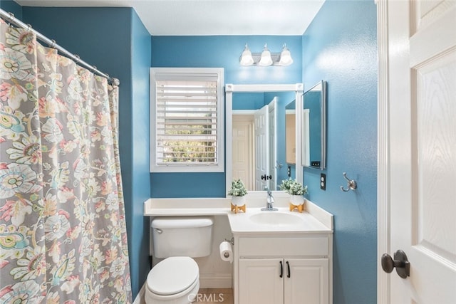 29290 Morena Villa Dr, Highland, CA 92346 - full bathroom with vanity, toilet, and a shower with shower curtain