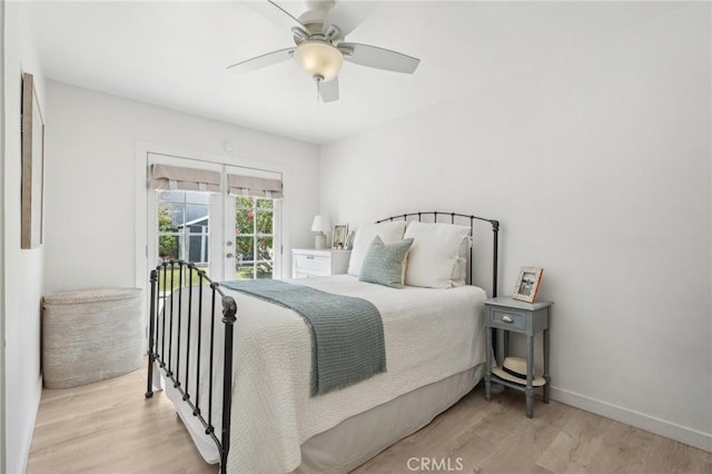 1120 9th St, Hermosa Beach, CA 90254 - bedroom with access to outside, wood finished floors, ceiling fan, and baseboards