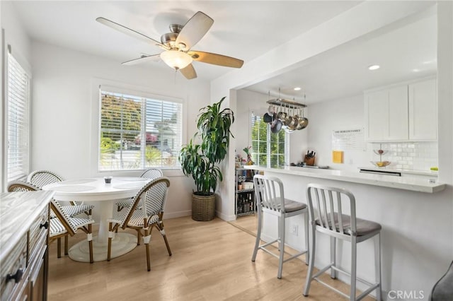 1120 9th St, Hermosa Beach, CA 90254 - dining space with light wood-type flooring, recessed lighting, a ceiling fan, and baseboards