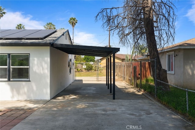 764 N Meridian Ave, Rialto, CA 92376 - view of patio / terrace featuring an attached carport and concrete driveway