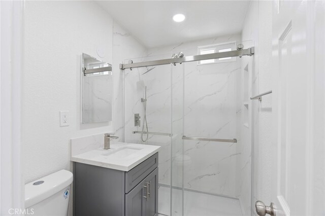 764 N Meridian Ave, Rialto, CA 92376 - full bathroom featuring toilet, vanity, and a marble finish shower