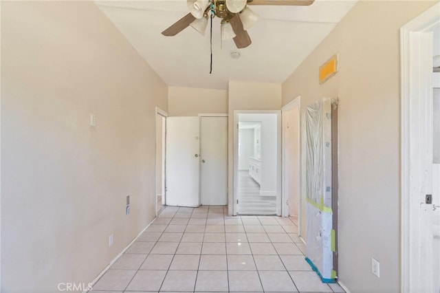 764 N Meridian Ave, Rialto, CA 92376 - unfurnished bedroom featuring light tile patterned flooring, baseboards, and ceiling fan