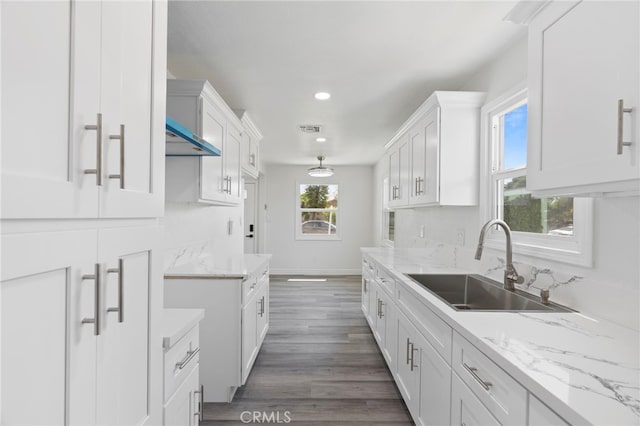 764 N Meridian Ave, Rialto, CA 92376 - kitchen with a sink, white cabinetry, baseboards, recessed lighting, and dark wood-style flooring