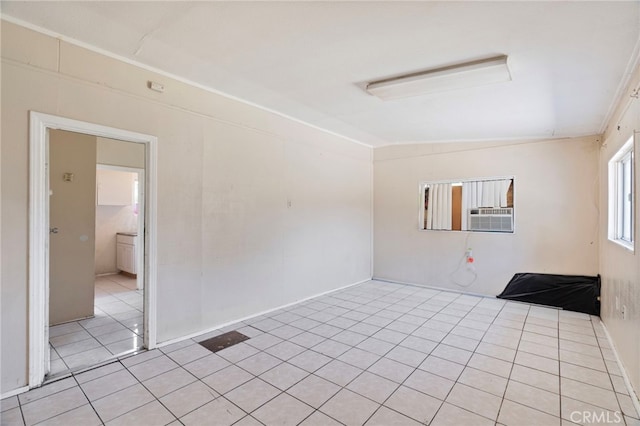 764 N Meridian Ave, Rialto, CA 92376 - empty room featuring light tile patterned flooring and cooling unit