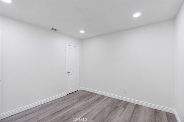 764 N Meridian Ave, Rialto, CA 92376 - spare room featuring light wood-style floors, baseboards, and recessed lighting