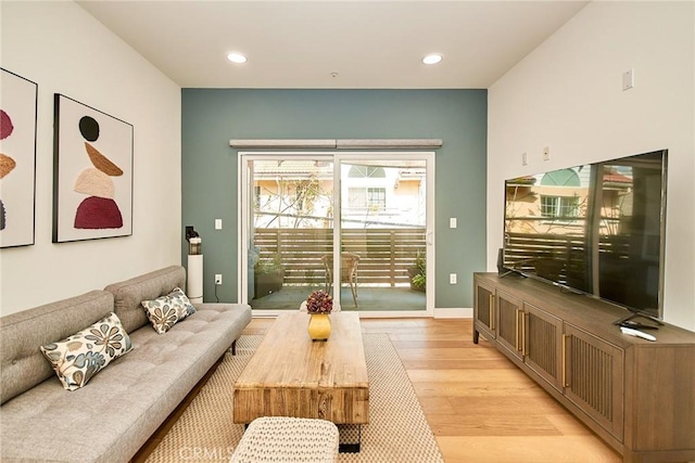 820 S Wilton Pl Unit 304, Los Angeles, CA 90005 - living room featuring light wood-style floors and recessed lighting