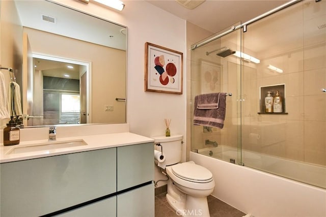 820 S Wilton Pl Unit 304, Los Angeles, CA 90005 - bathroom with toilet, vanity, bath / shower combo with glass door, and tile patterned floors