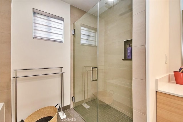 820 S Wilton Pl Unit 304, Los Angeles, CA 90005 - bathroom with a shower stall, vanity, and tile patterned floors