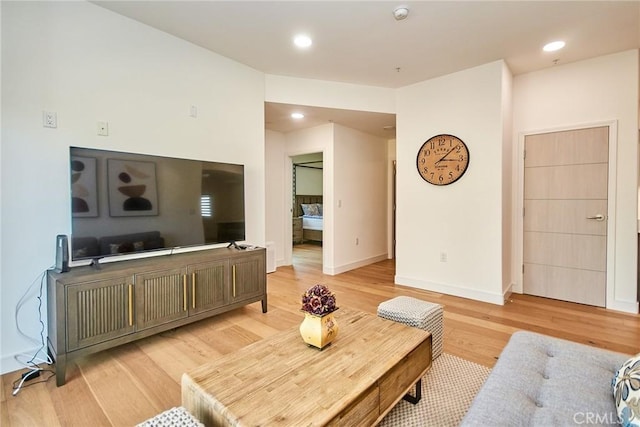 820 S Wilton Pl Unit 304, Los Angeles, CA 90005 - living area featuring light wood-type flooring, baseboards, and recessed lighting