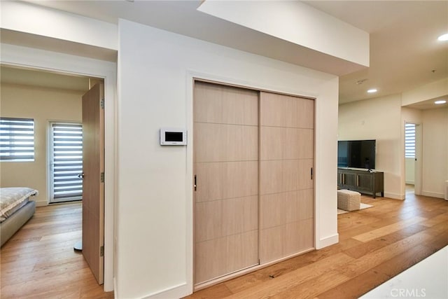 820 S Wilton Pl Unit 304, Los Angeles, CA 90005 - corridor with light wood-type flooring, recessed lighting, and baseboards