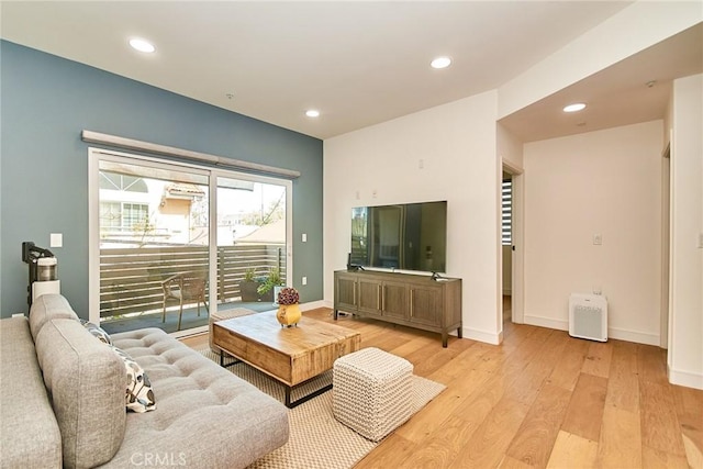 820 S Wilton Pl Unit 304, Los Angeles, CA 90005 - living room featuring light wood-style floors, recessed lighting, and baseboards