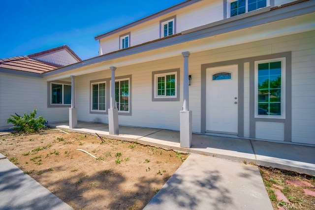 1264 W Etiwanda Ave, Rialto, CA 92376 - doorway to property featuring covered porch