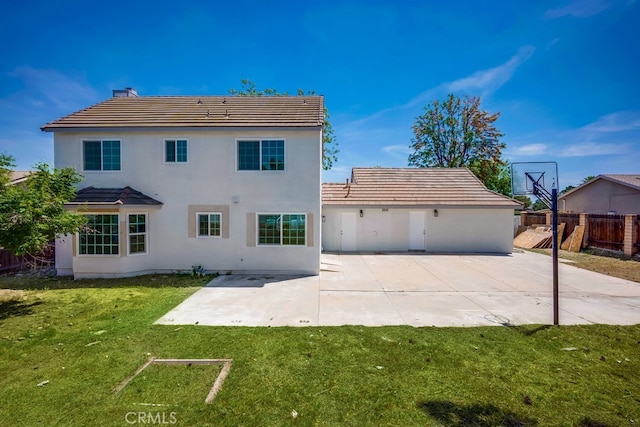 1264 W Etiwanda Ave, Rialto, CA 92376 - back of house featuring a chimney, a patio, a tile roof, and stucco siding