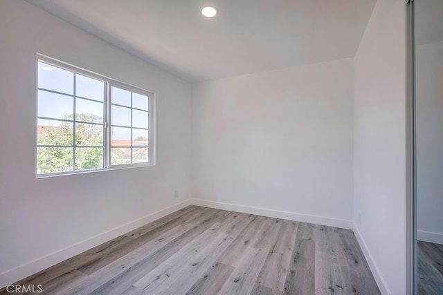 1264 W Etiwanda Ave, Rialto, CA 92376 - empty room featuring baseboards, light wood-type flooring, and recessed lighting