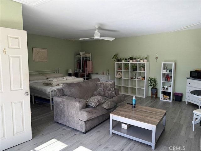 15911 Dundalk Ln, Huntington Beach, CA 92647 - living room featuring wood finished floors and a ceiling fan