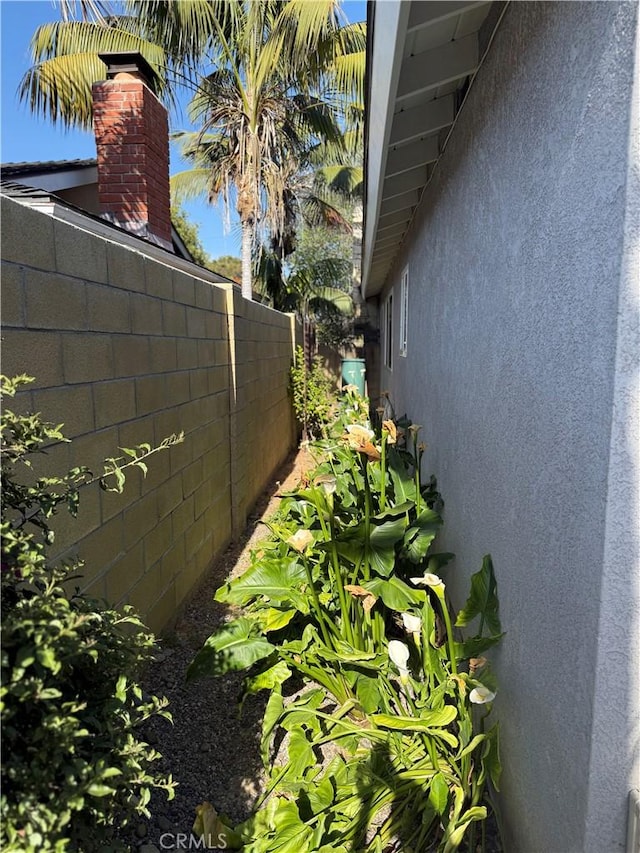 15911 Dundalk Ln, Huntington Beach, CA 92647 - view of side of home featuring stucco siding