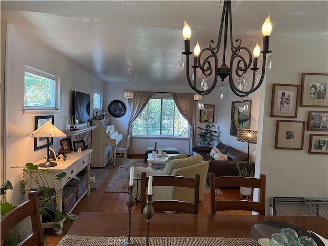 15911 Dundalk Ln, Huntington Beach, CA 92647 - living room featuring wood finished floors and a chandelier