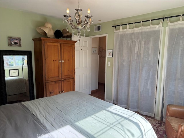 15911 Dundalk Ln, Huntington Beach, CA 92647 - bedroom featuring a chandelier and baseboards