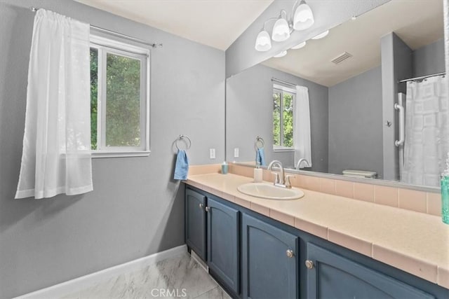 8510 Verdant Ct, Los Molinos, CA 96055 - full bathroom with vanity, baseboards, and toilet