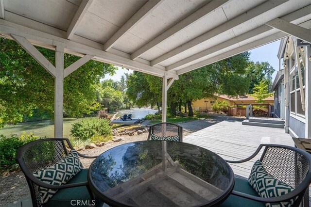 8510 Verdant Ct, Los Molinos, CA 96055 - view of patio / terrace with outdoor dining area and a wooden deck