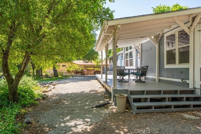 8510 Verdant Ct, Los Molinos, CA 96055 - view of patio with a deck