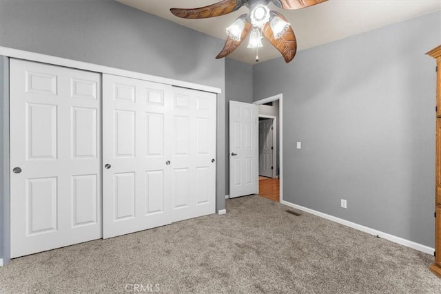 8510 Verdant Ct, Los Molinos, CA 96055 - unfurnished bedroom featuring carpet, a closet, baseboards, and a ceiling fan