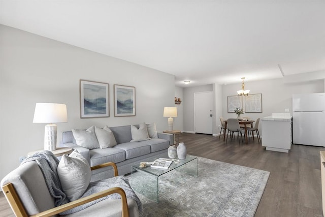 6955 Alvarado Rd Unit 77, San Diego, CA 92120 - living area with a chandelier, dark wood-style flooring, and baseboards