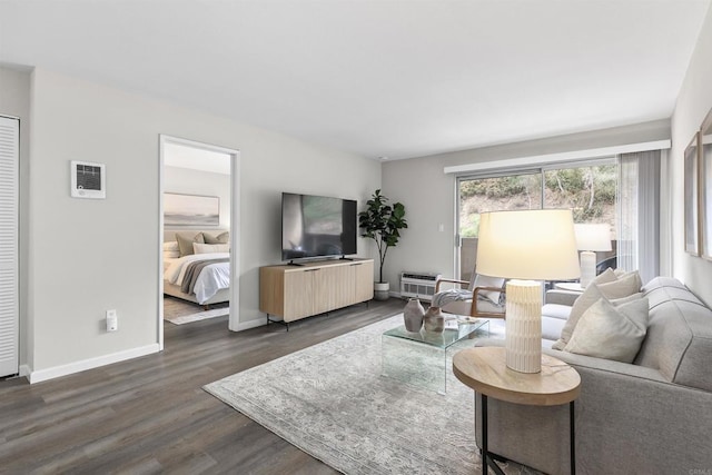 6955 Alvarado Rd Unit 77, San Diego, CA 92120 - living room featuring dark wood-style flooring and baseboards