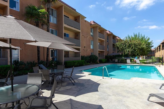 6955 Alvarado Rd Unit 77, San Diego, CA 92120 - community pool with a patio area
